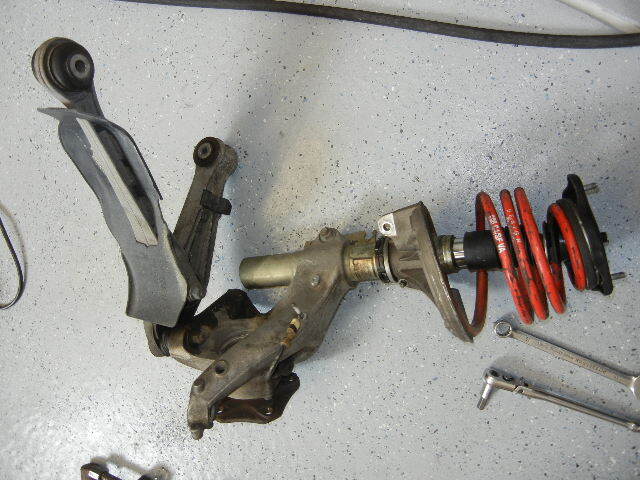 Porsche 996 Turbo removing the strut. Porsche 996 Turbo removing the strut.